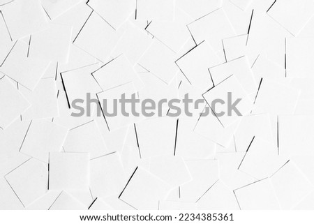Pile of blank pieces of paper scattered around