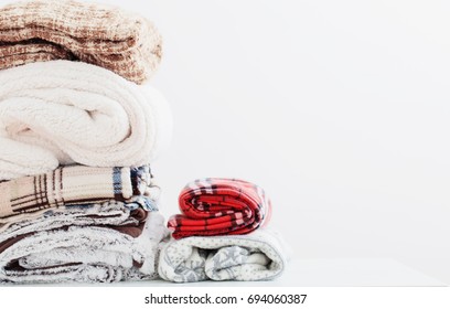 Pile Of Blankets On A White Background