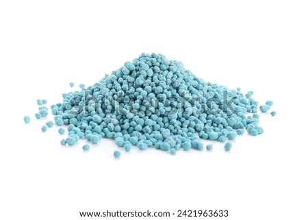 Pile of blue granular fertilizer isolated on white background [[stock_photo]] © 