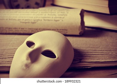 A Pile Of Books And A Mask, Depicting The Concept Of Playwriting And Performing Arts