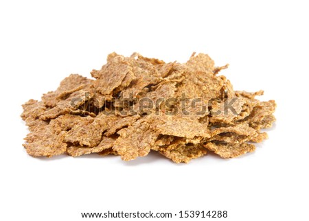 Pile of bran flakes over white background