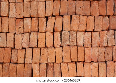 Pile bricks