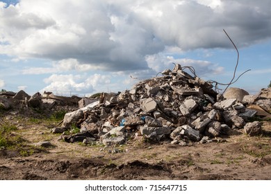 Pile Of Broken Concrete Blocks. Construction Debris.