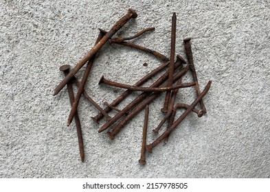 pile of broken, rusty nails
