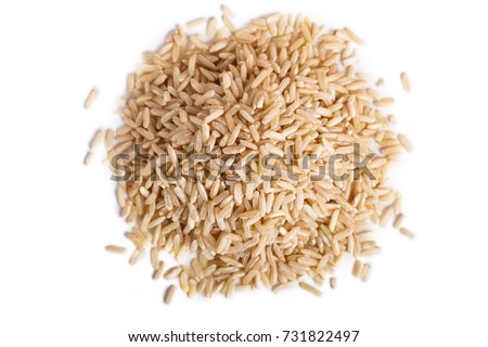 Pile of  brown rice isolated on white background.  Top view.
