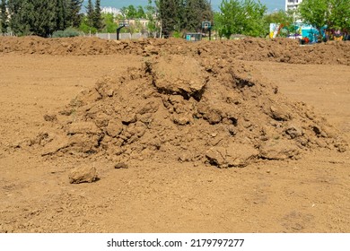 Pile Of Brown Soil. Construction Dirt Pile. Industry