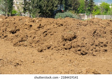 Pile Of Brown Soil. Construction Dirt Pile. Industry