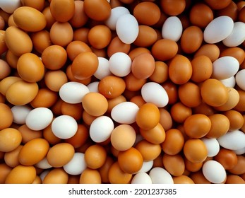 Pile Of Brown And White Eggs For Sale. Fresh Local Produce Market. 