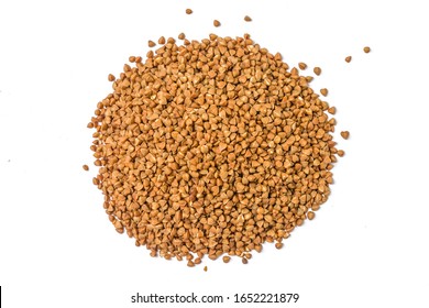 Pile of buckwheat isolated on white background. Top view. Buckwheat. Stockpiling. Buckwheat grains. Grain culture. Гречка. Pandemic