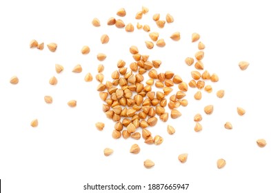 Pile of buckwheat seeds isolated on white background, top view. Buckwheat seeds isolated on white. Buckwheat grains isolated on white background, top view. Buckwheat for porridge.