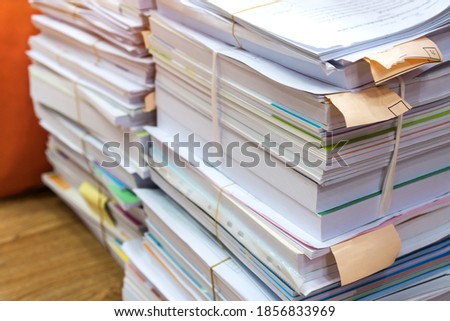 Pile of bunch education documents or books report teacher after approve and checking from admistrator, Annual Reports document for evaluation in student study in university office