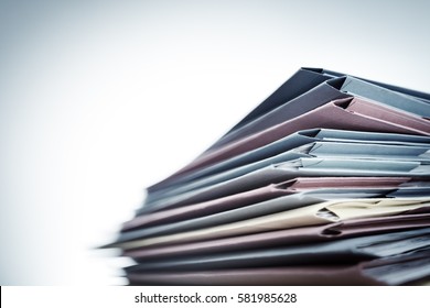 Pile of business document files - Shutterstock ID 581985628