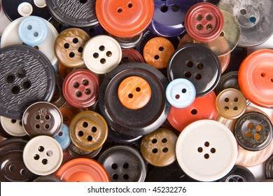 Pile of buttons close up background