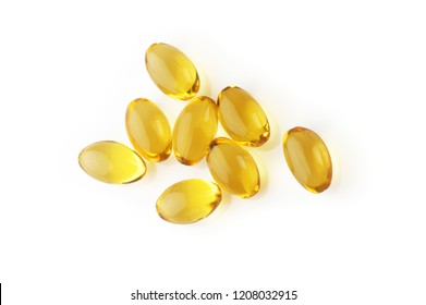 Pile Of Capsules With Cod Liver Oil Close-up Isolated On White Background. Top View Point.