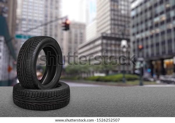 Pile of car tyres\
isolated on background