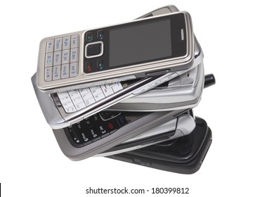 Pile Of Cell Phones, Cut Out On White Background