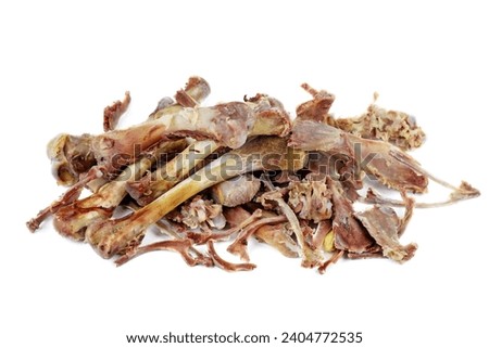 Pile of chicken bones isolated on a white background.