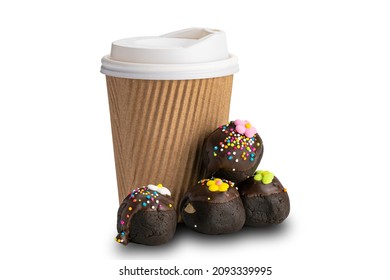 Pile Of Chocolate Balls Topping With Rainbow Sprinkles And Sugar Flowers And A Paper Cup Of Coffee On White Background With Clipping Path.