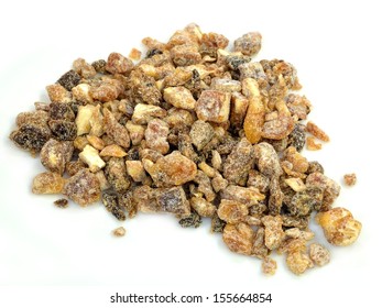 A Pile Of Chopped Dates On A White Background.