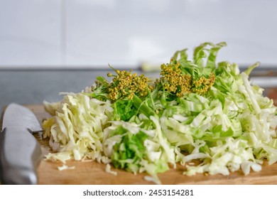 A pile of chopped vegetables in kitchen counter cabbage carrot etc. - Powered by Shutterstock