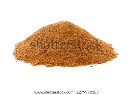 Pile of cinnamon powder isolated on white background. Cinnamon powder isolated on white background. Heap of cinnamon powder on a white background.