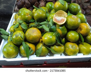 Pile Of Citrus Fruits On A Basket In A Fruit Shop