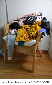 Pile Of Clothes On A Chair