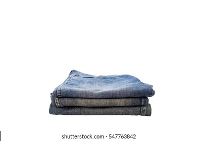 Pile Of Clothes,stack Of Blue Jeans Isolated On White Background