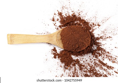 Pile Cocoa Powder With Wooden Spoon Isolated On White Background