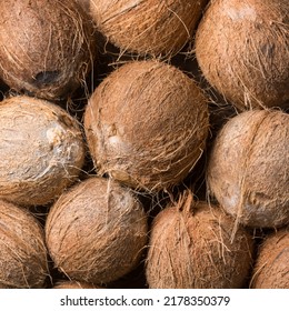 Pile Of Coconuts, Healthy Tropical Fruits Without Husk, Background, Taken From Above