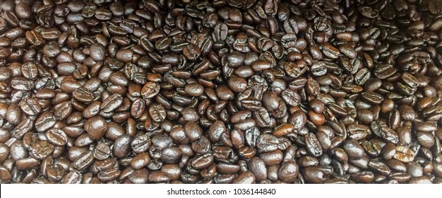 Pile of coffee beans on display for sale - Shutterstock ID 1036144840