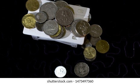Pile of coins on the table using as financial and business marketing concept