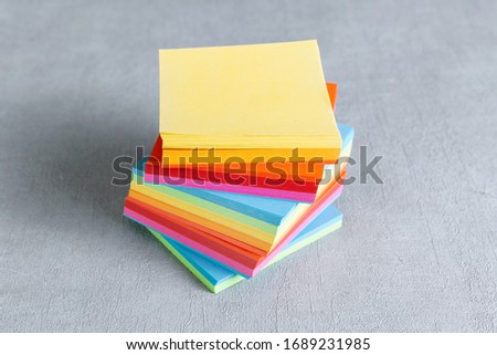 A pile of colored post-its