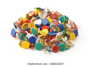 Pile Of Colorful Metal Thumb Tacks Isolated On White