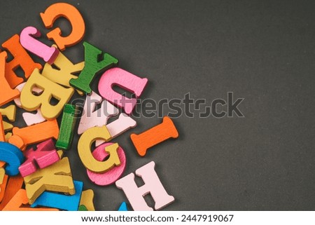 A Pile of Colorful Plastic Letters on Table, School Concept, Education Banner