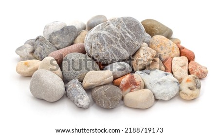 Pile of colorful stones isolated on a white background.