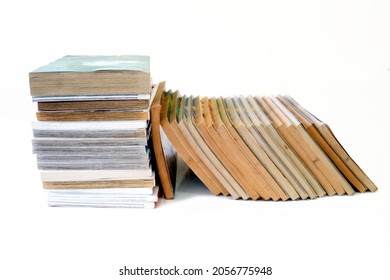 A Pile Of Comic Books. A Lot Of Japanese Anime On White Background.