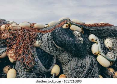 Pile commercial fish nets and gill nets, Fishermen's Terminal, Seattle, Washington - Shutterstock ID 1817218898