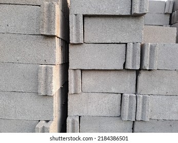 Pile Of Concrete Brick That Will Be Used For Construction. Pile Of Grey Stone Brick For Sale 