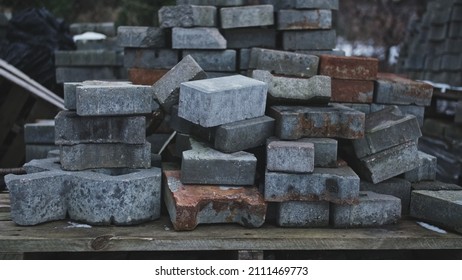 Pile Of Concrete Paving Sett Stacked Outdoors