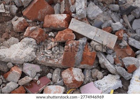 Pile of construction debris and broken bricks at a demolition site