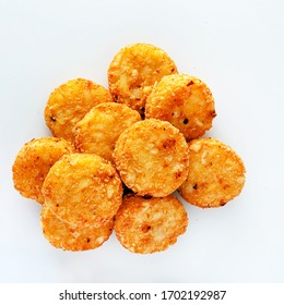 Pile Of Cooked Potato Hash Browns Isolated On A White Background