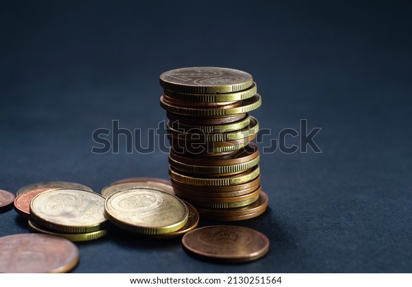 Pile copper coin, quarters, nickels, dimes pennies\
fifty cent piece