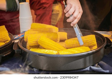 Pile of corn cobs for grill cooking, street diet fast food - Powered by Shutterstock