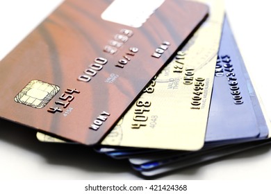 Pile Of Credit Cards On White Background