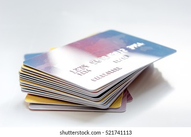 Pile Of Credit Cards On White Background