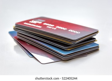 Pile Of Credit Cards On White Background