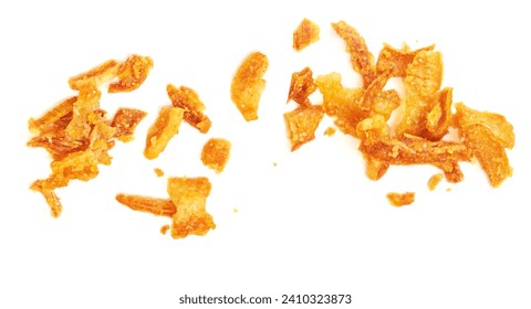 Pile of crispy fried onions isolated on white.  Roasted Onions Top view. Flat lay
