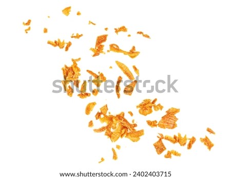 Pile of crispy fried onions isolated on white.  Roasted Onions Top view. Flat lay
