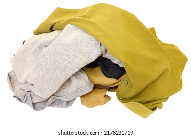 Pile of crumpled clothes on a white background. Clothes for washing isolate on white.